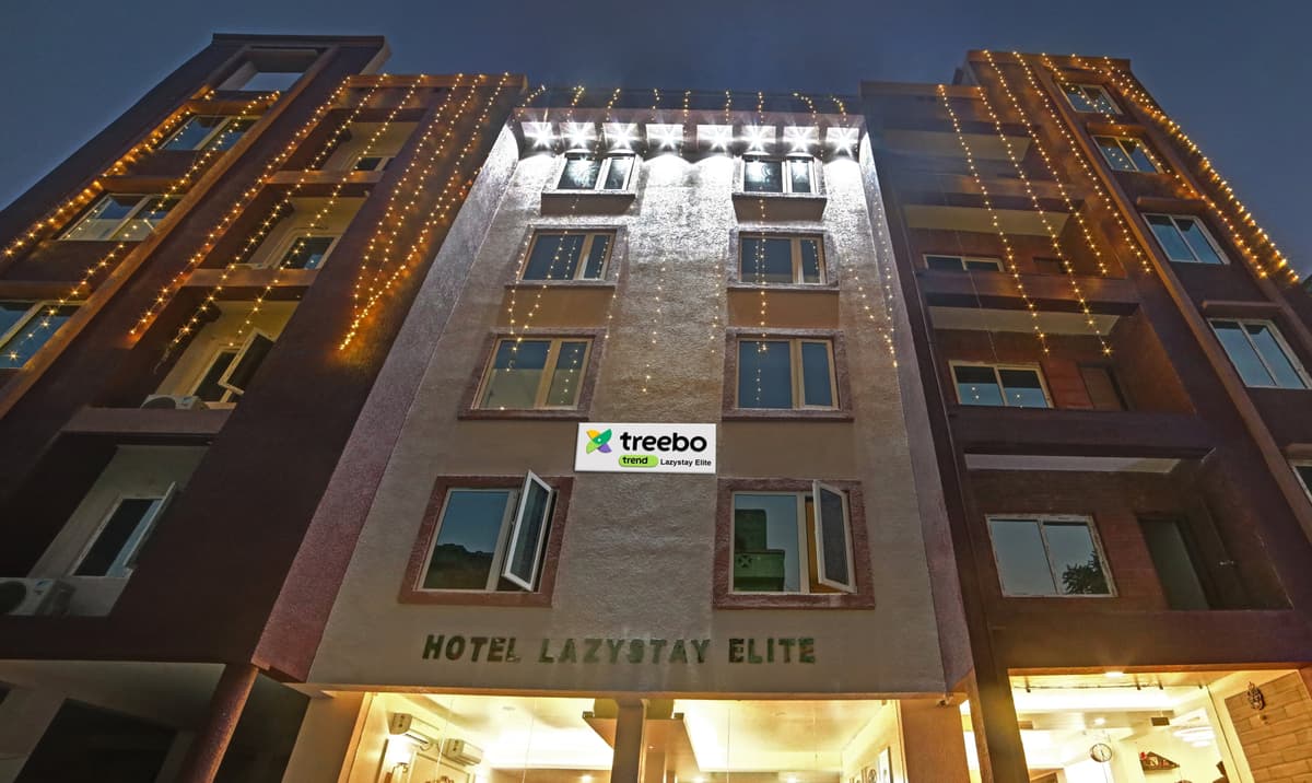 LazyStay Elite facade by night